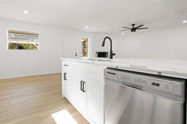 a view of a storage & utility room with washer and dryer
