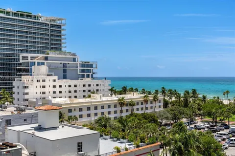 a view of a city with tall buildings