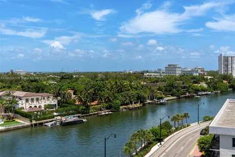 an aerial view of a city with lake view