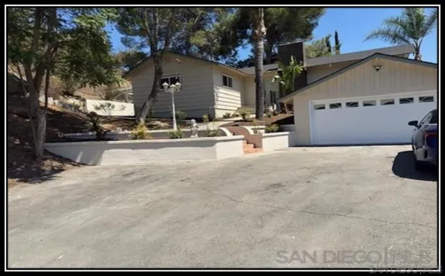 an outdoor space with garden view