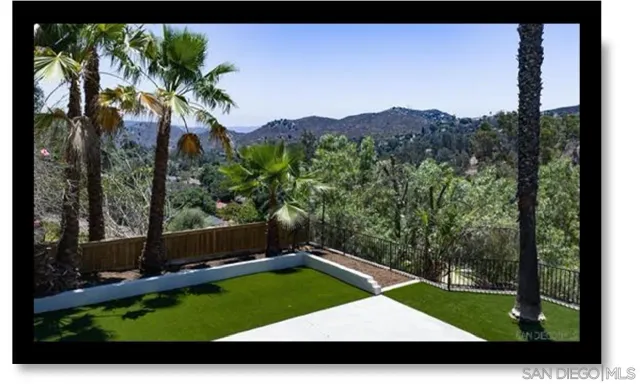 a view of an outdoor space and a yard
