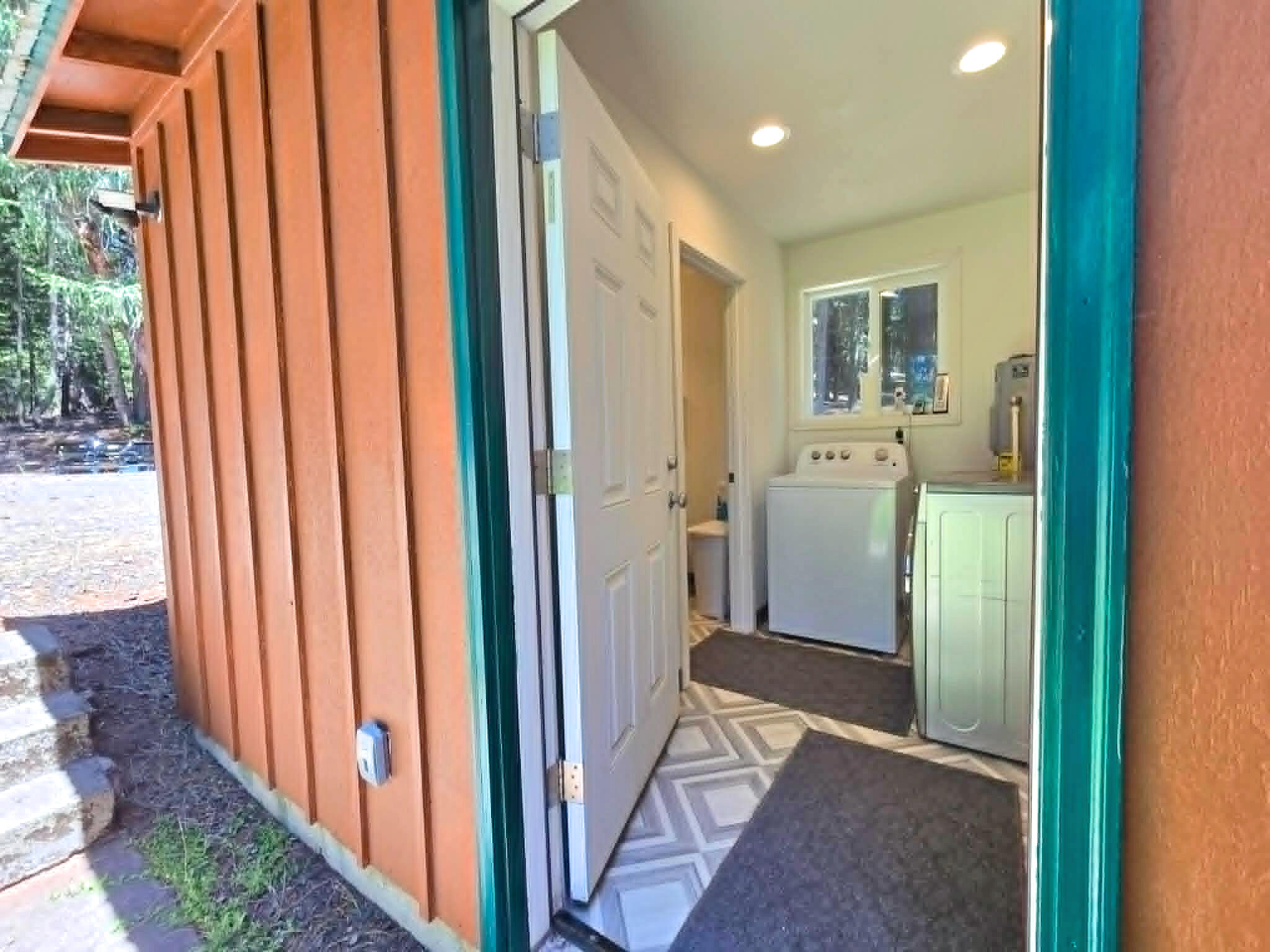 836 Ulrich Road Prospect, OR 97536 - Photo 25 of 47 a view of a hallway with bathroom and wooden floor