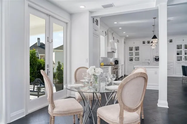 a bedroom with a large bed and a couch