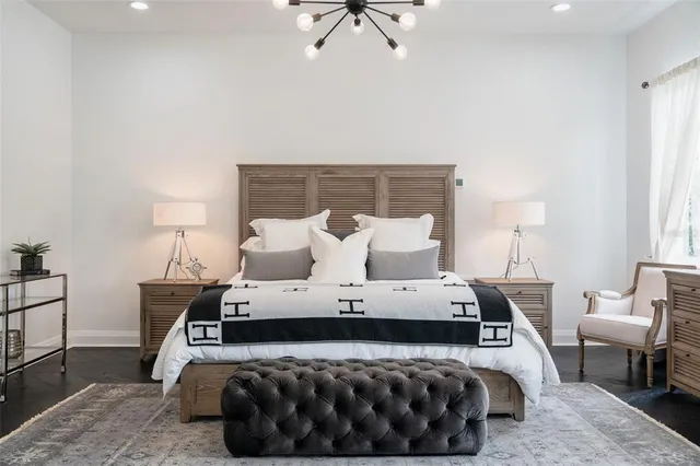 a white bath tub sitting in a bathroom and shower