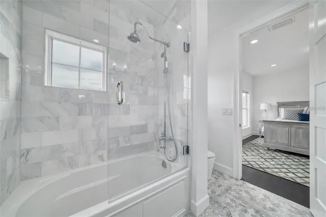 a bathroom with a sink vanity and mirror