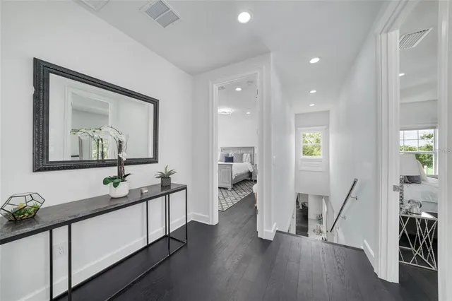 a view of backyard with swimming pool and outdoor seating