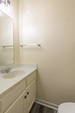 a bathroom with a toilet and a sink
