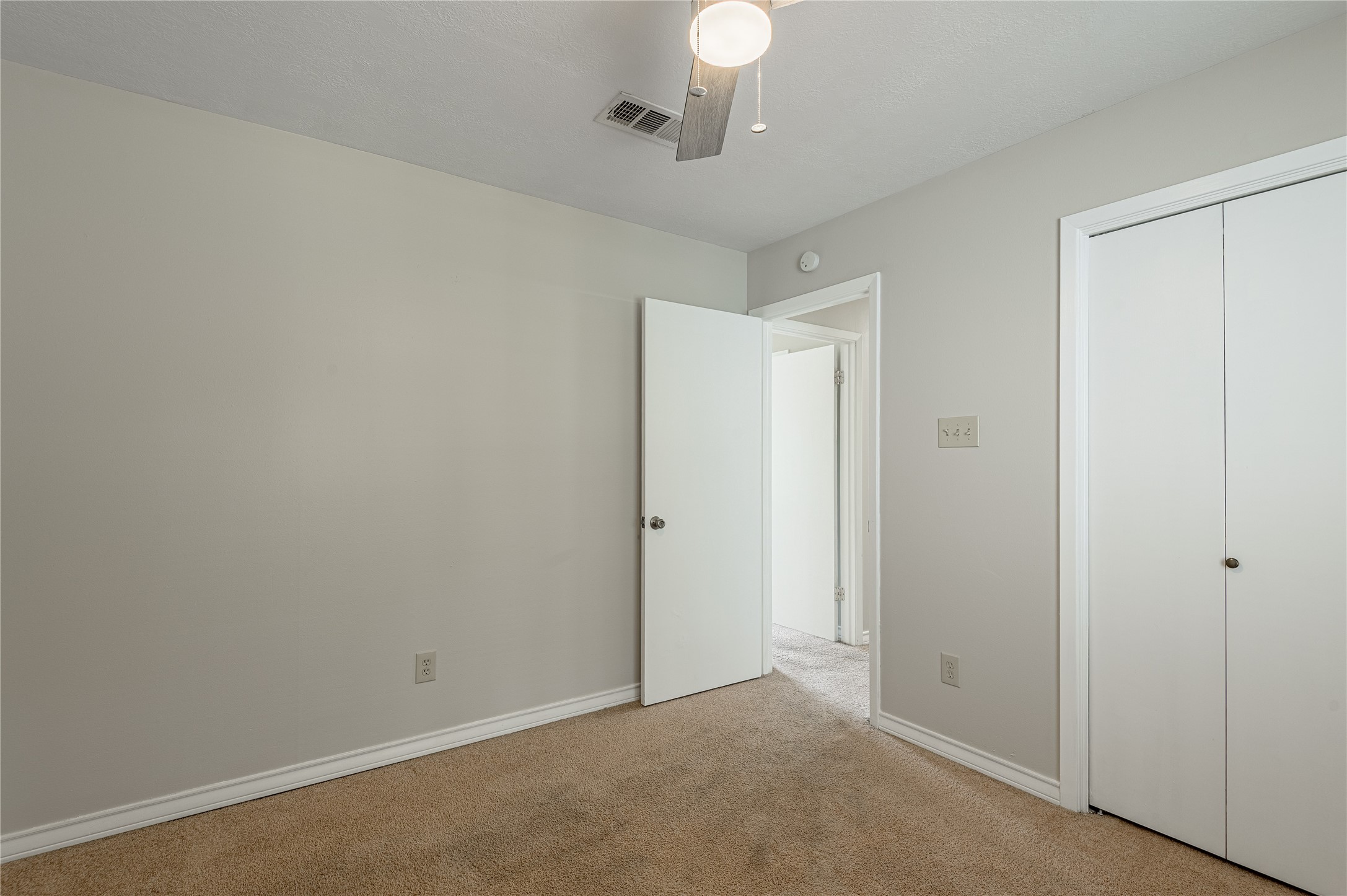 1401 Ave O, Unit F Huntsville, TX 77340 - Photo 20 of 26 wooden floor in an empty room