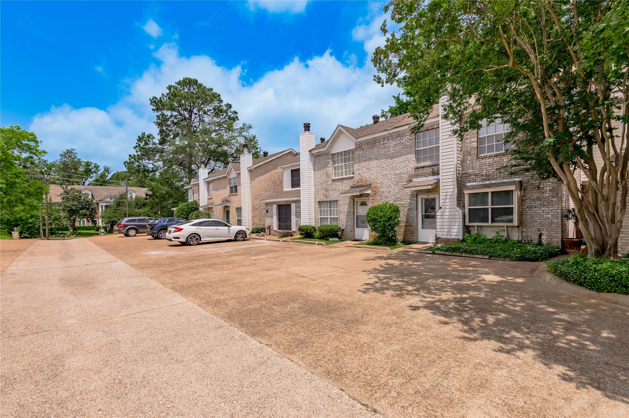 1401 Ave O, Unit F Huntsville, TX 77340 - Photo 21 of 26 a view of street with parked cars