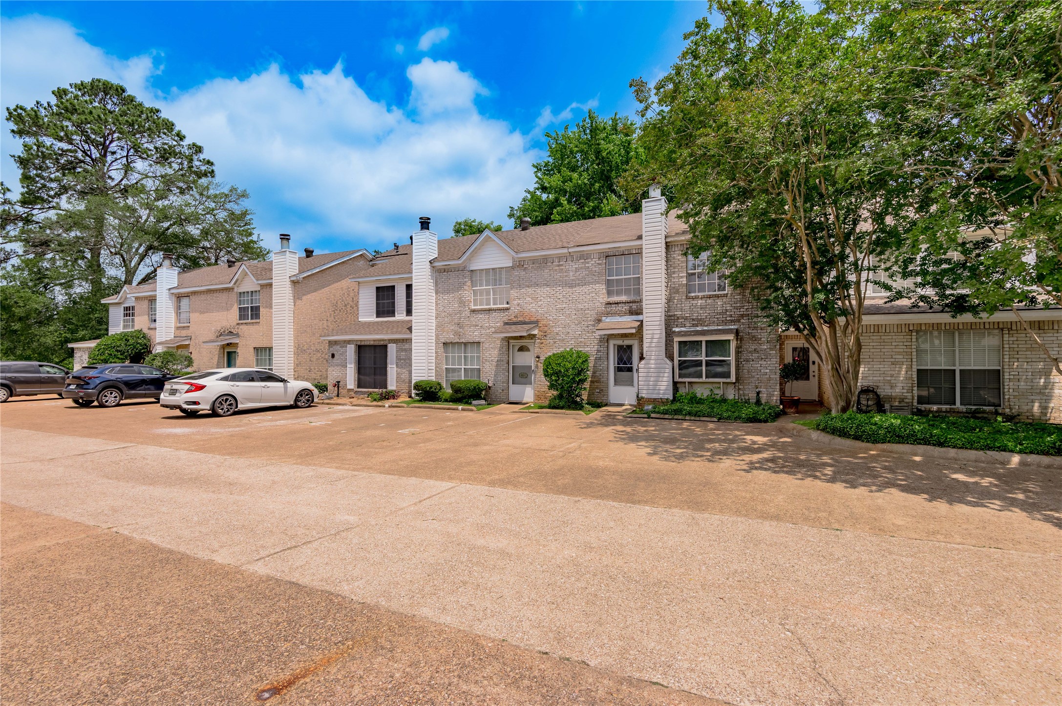 1401 Ave O, Unit F Huntsville, TX 77340 - Photo 23 of 26 a car parked in front of a house