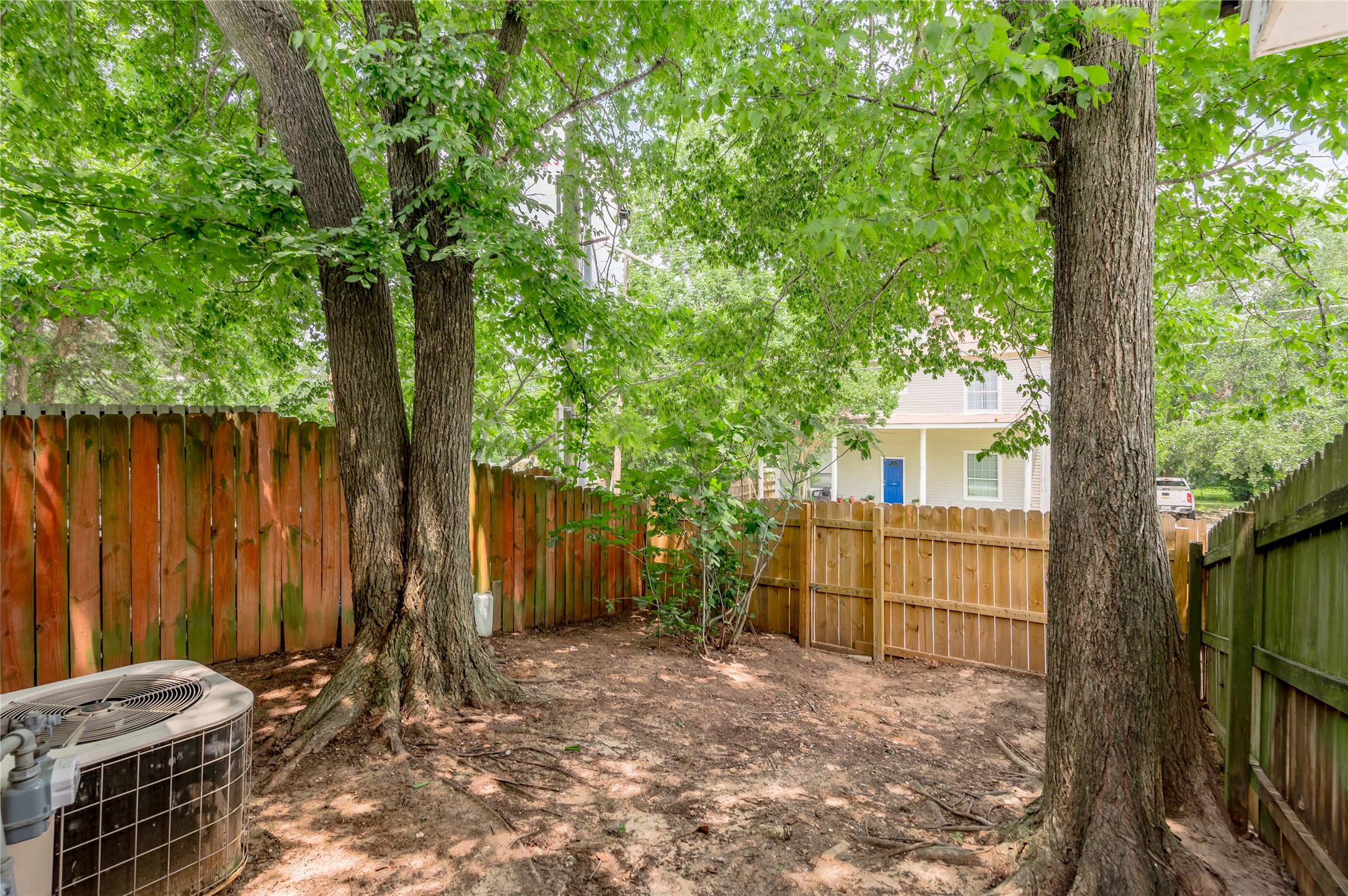 1401 Ave O, Unit F Huntsville, TX 77340 - Photo 25 of 26 a view of backyard with a trees