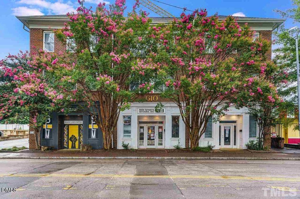 a front view of a house with yard