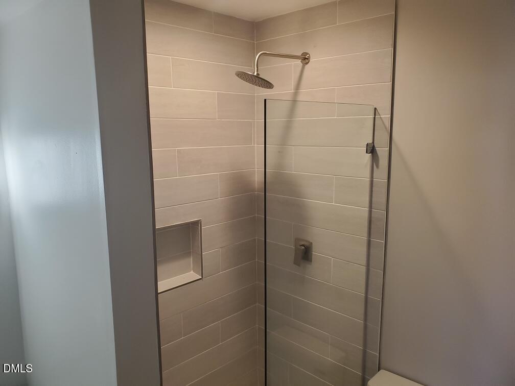 610 Hillsborough Street, Unit 205 Raleigh, NC 27603 - Photo 11 of 15 a bathroom with a shower