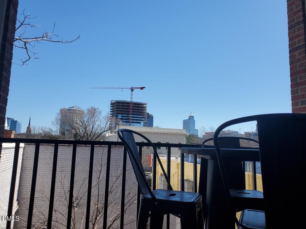 610 Hillsborough Street, Unit 205 Raleigh, NC 27603 - Photo 13 of 15 a view of balcony with furniture