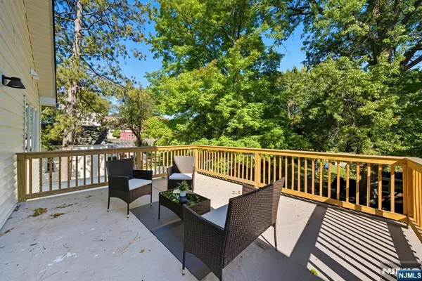 a view of a two chairs in the deck