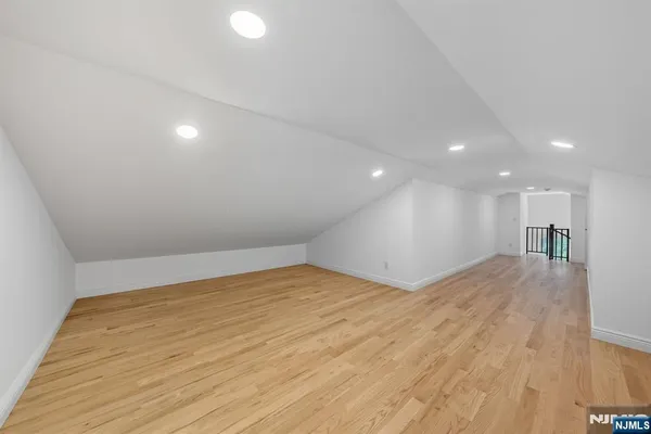 a view of a room with cabinet and mirrors