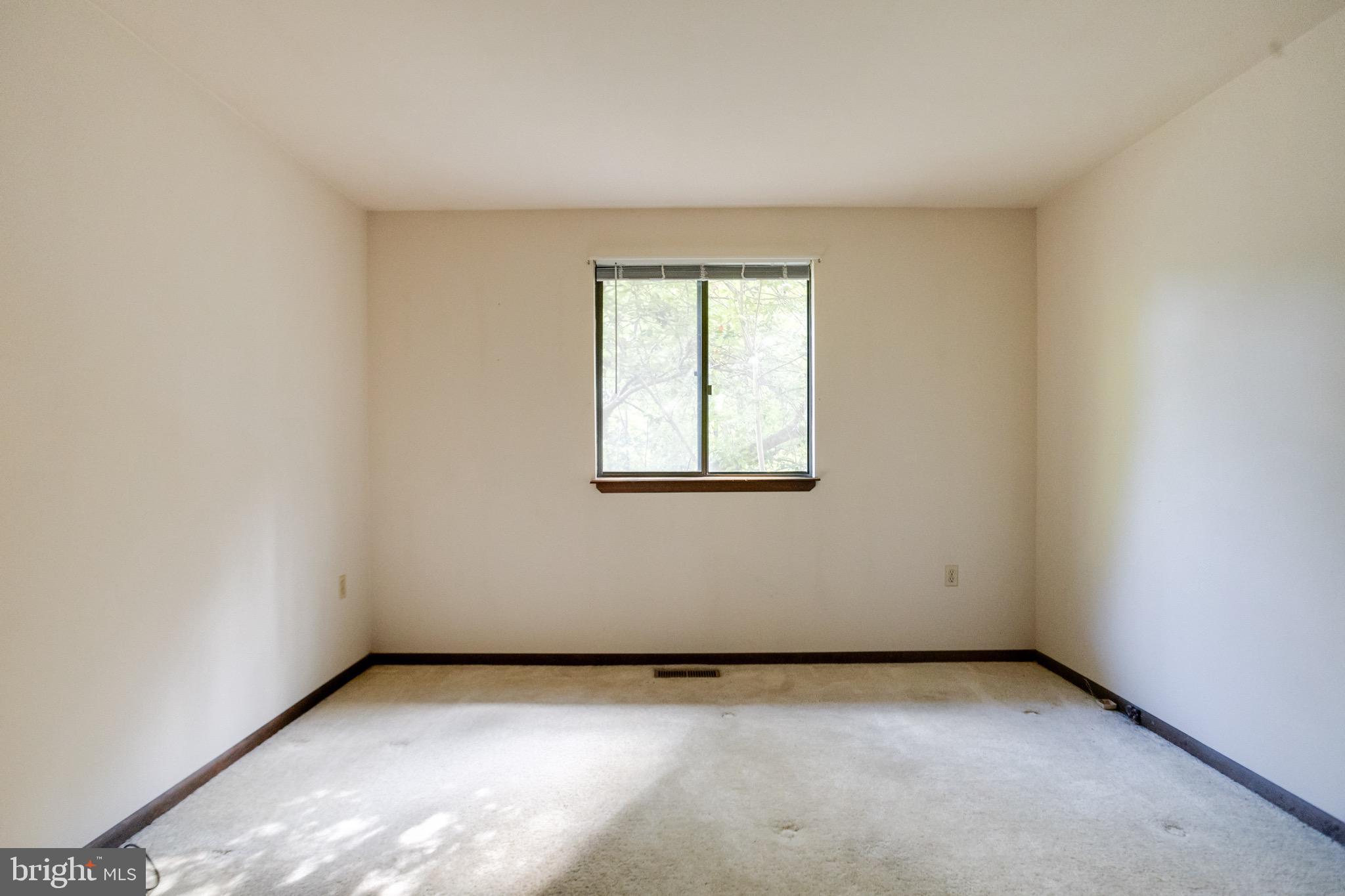 3160 Rolling Road Edgewater, MD 21037 - Photo 28 of 62 an empty room with a window