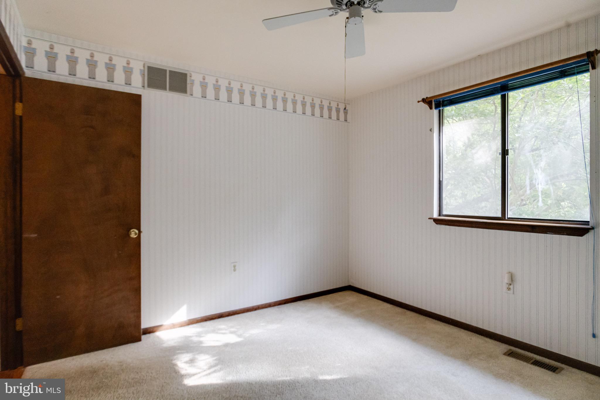 3160 Rolling Road Edgewater, MD 21037 - Photo 31 of 62 a view of an empty room with a window