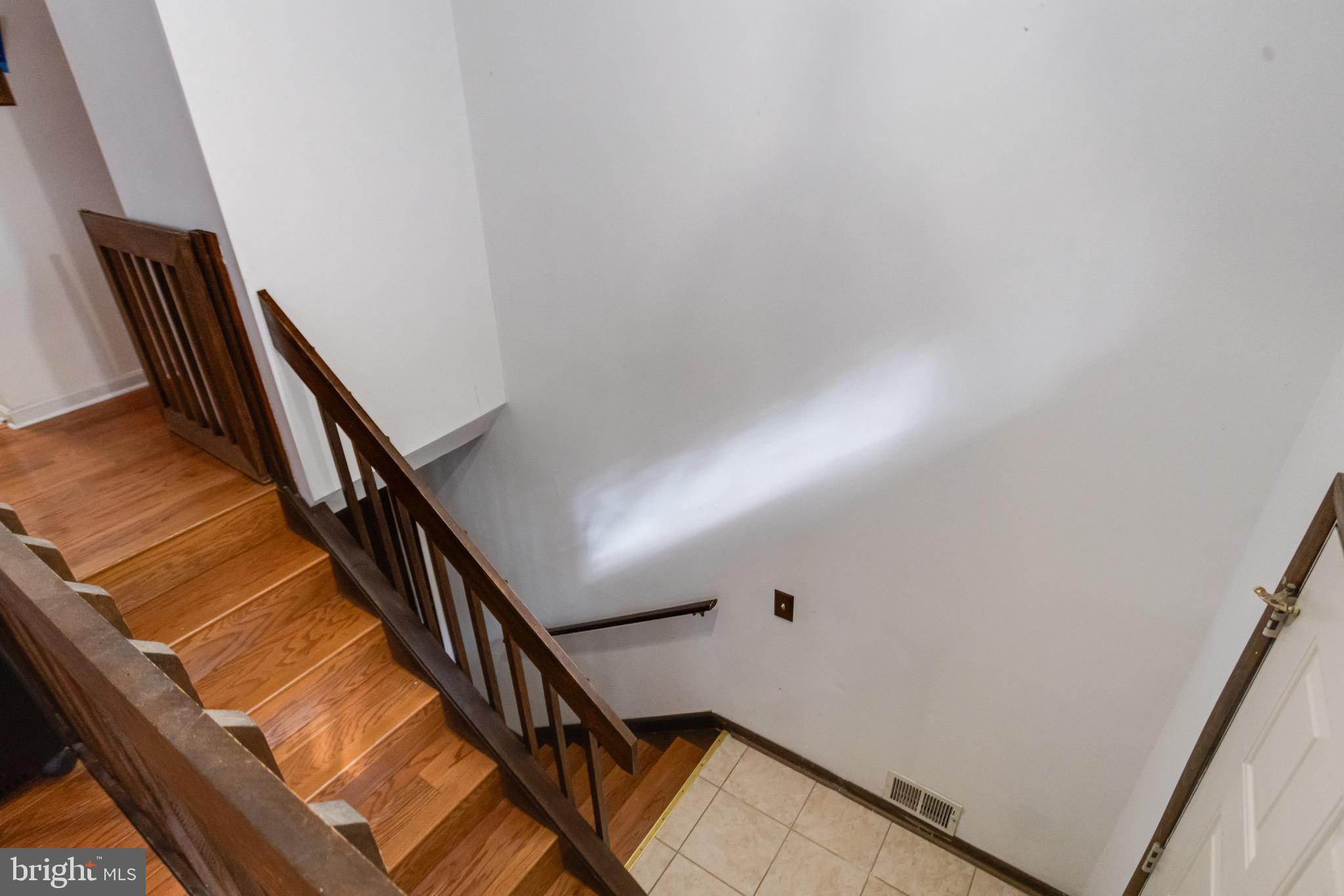 3160 Rolling Road Edgewater, MD 21037 - Photo 5 of 62 a view of entryway with wooden floor