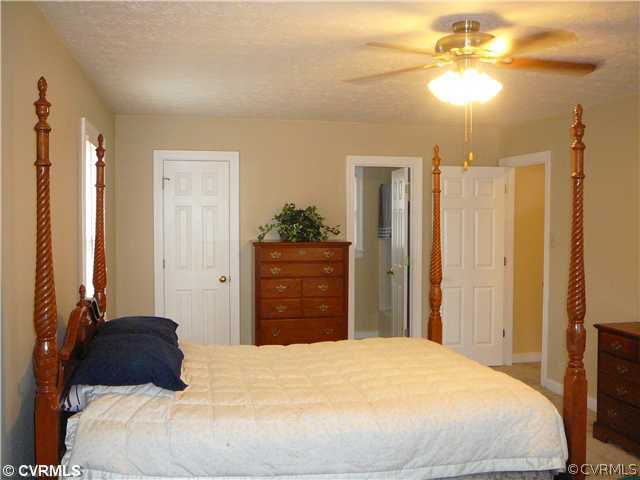 912 Rasmussen Drive Sandston, VA 23150 - Photo 9 of 12 Master Bedroom - Bright Master Bedroom with Privat
