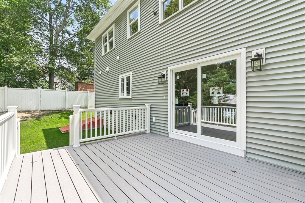 26 Flagg Street Woburn, MA 01801 - Photo 36 of 39 a view of a house with deck