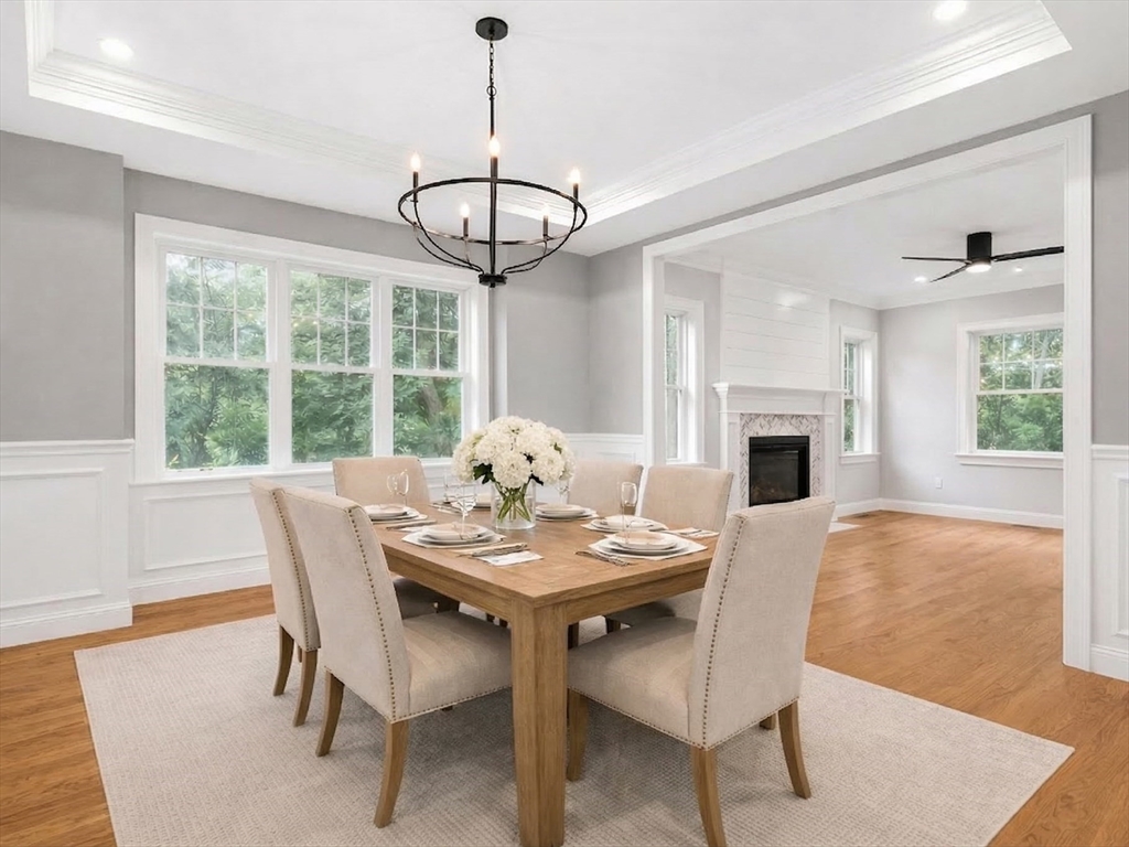 26 Flagg Street Woburn, MA 01801 - Photo 8 of 39 a view of a dining room with furniture window and wooden floor