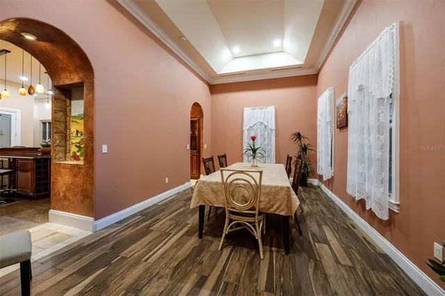 a view of a hallway with seating area