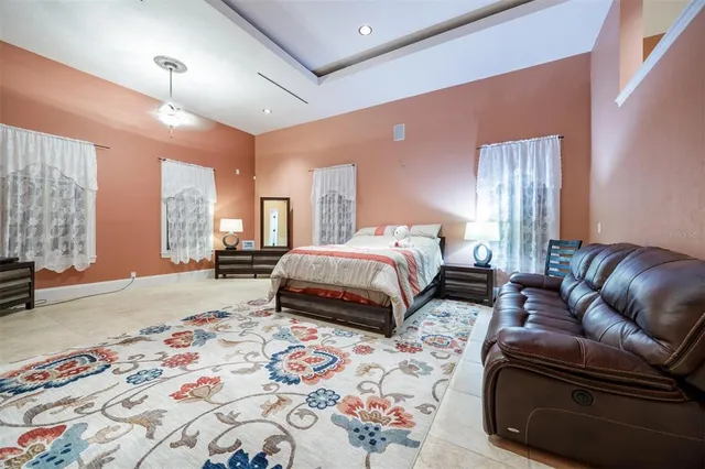 a bedroom with a bed and a walk in closet