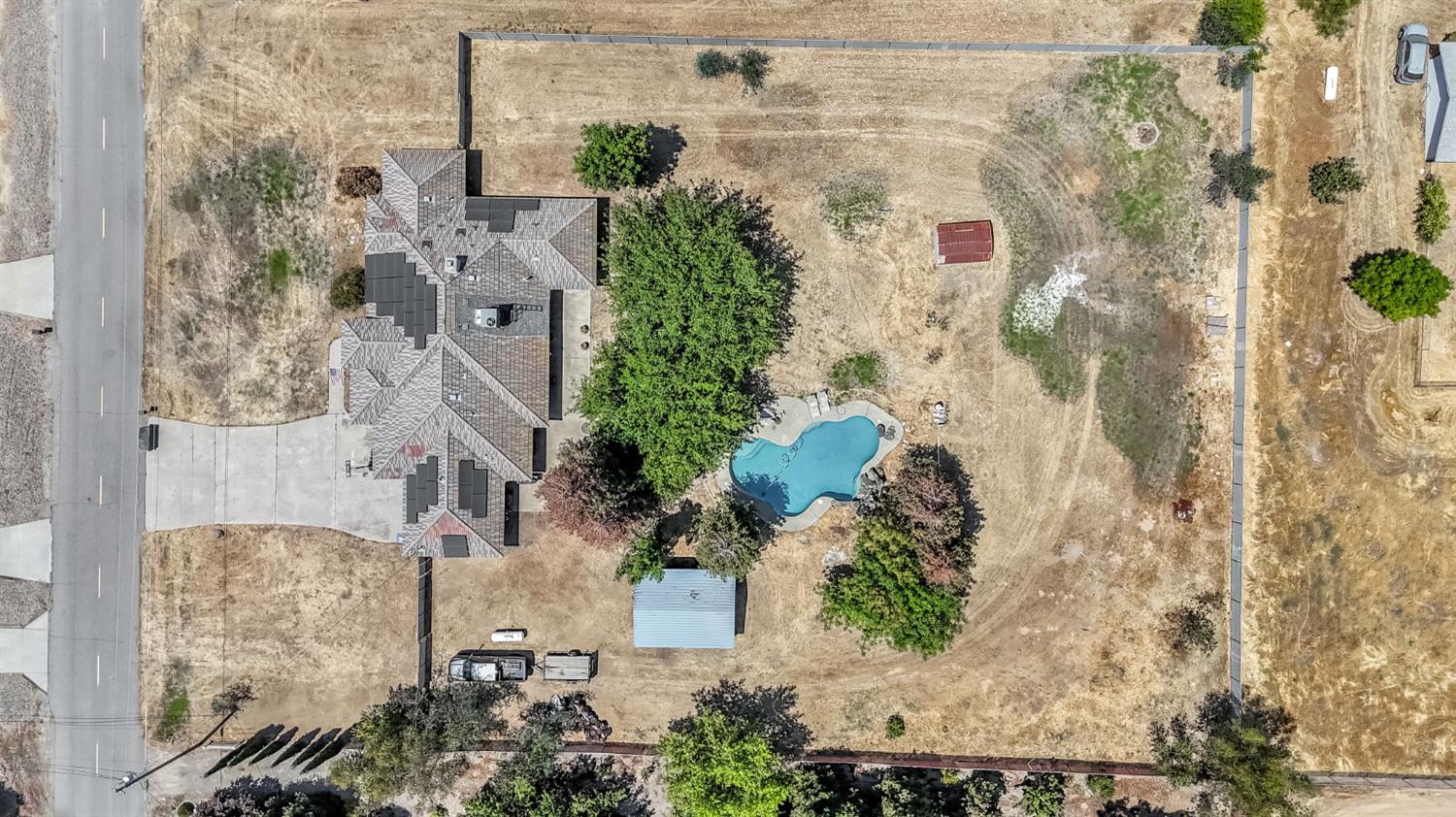 36065 Manon Avenue Madera, CA 93636 - Photo 2 of 50 an aerial view of residential houses with outdoor space