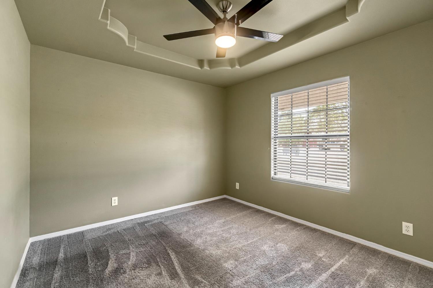 36065 Manon Avenue Madera, CA 93636 - Photo 23 of 50 a view of an empty room with a window