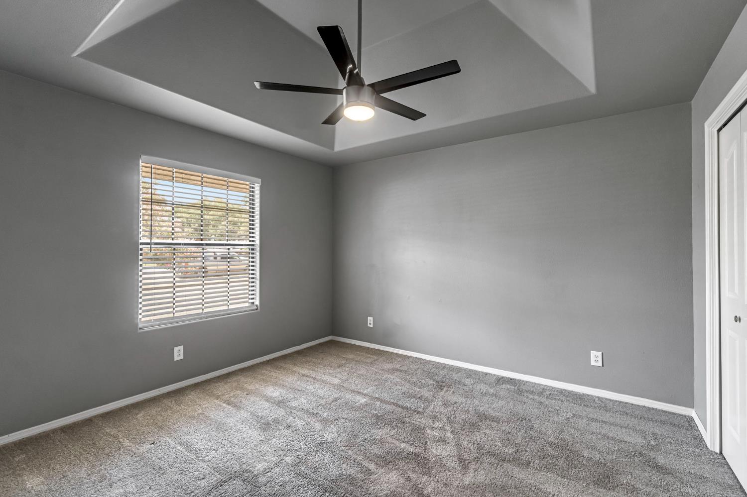 36065 Manon Avenue Madera, CA 93636 - Photo 28 of 50 a view of an empty room with a window