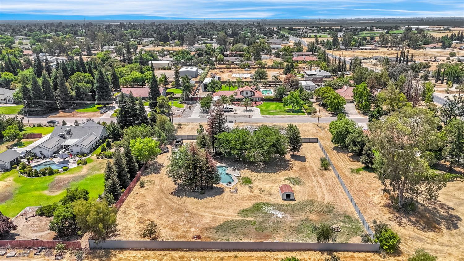 36065 Manon Avenue Madera, CA 93636 - Photo 50 of 50 an aerial view of residential houses with outdoor space
