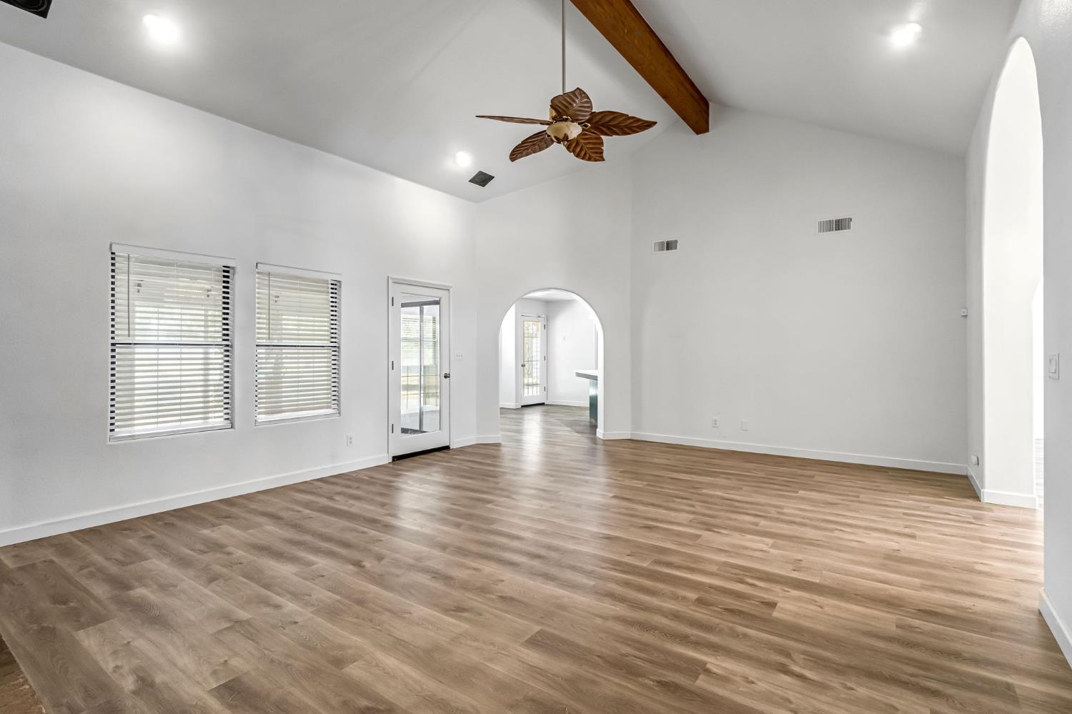 36065 Manon Avenue Madera, CA 93636 - Photo 6 of 50 wooden floor in an empty room with a window