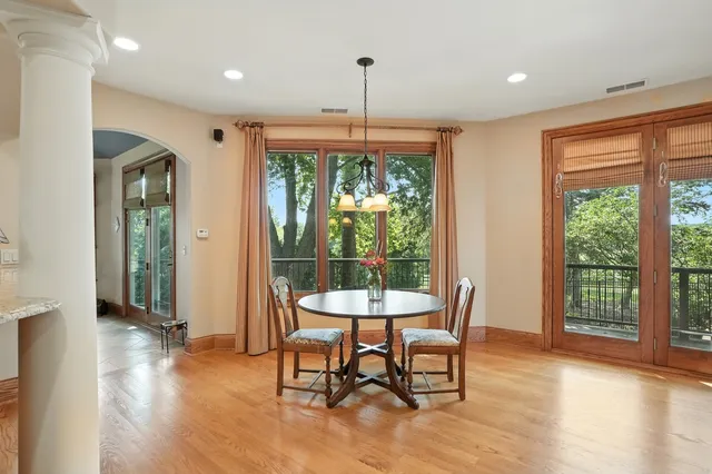 a view of a dining room with furniture window and outside view