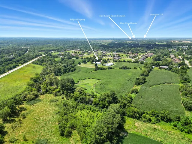 a view of a city with mountains in the background