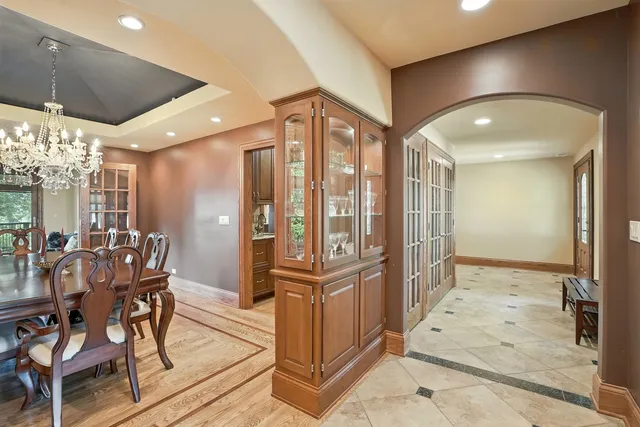 a view of a livingroom with furniture and a floor to ceiling window