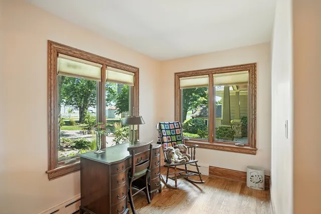 a view of a patio with table and chairs and potted plants