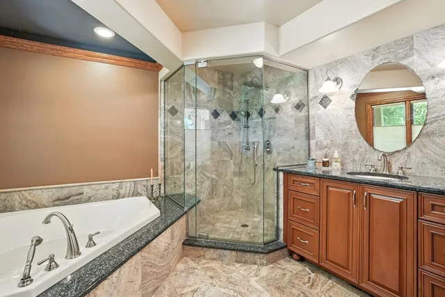 front view of a house with a tree