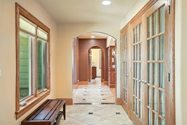 a view of an empty room with wooden walls