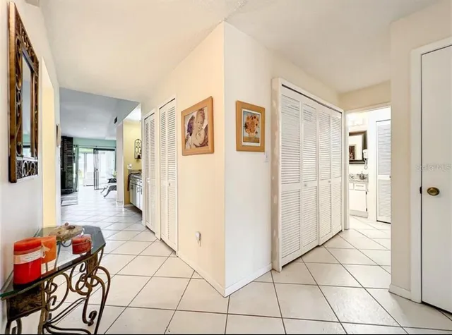 a view of a livingroom with furniture and an entryway