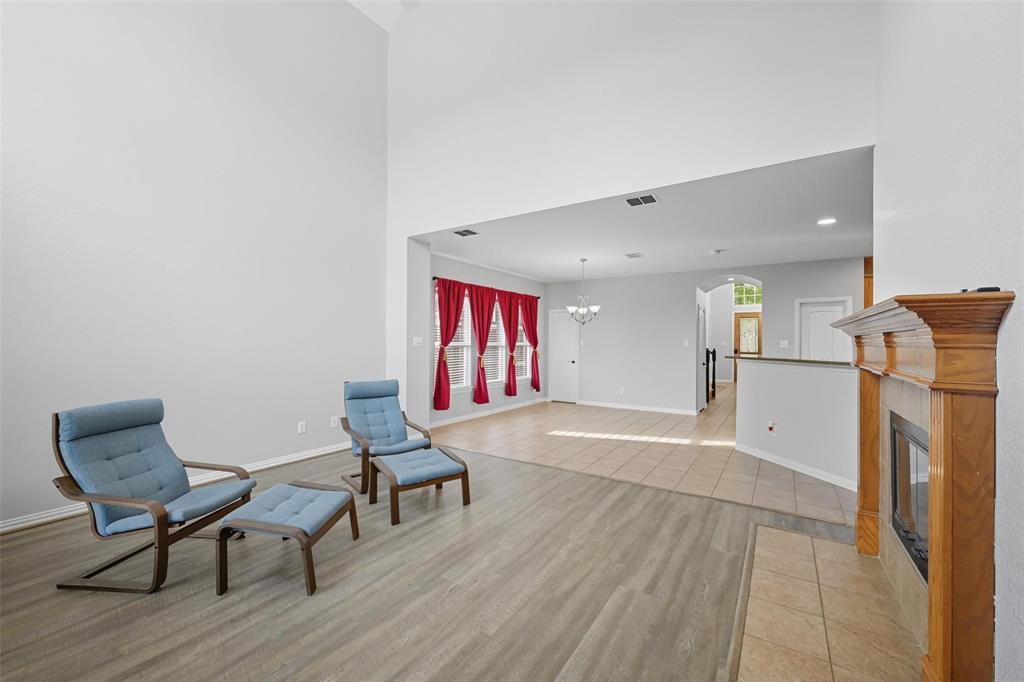 11577 Mansfield Drive Frisco, TX 75035 - Photo 19 of 37 a view of livingroom with furniture and wooden floor