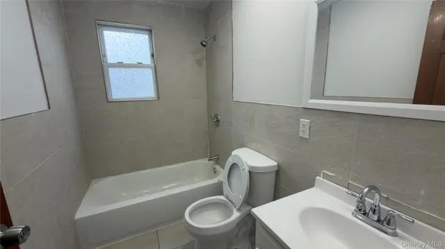 a kitchen with a sink stove and refrigerator