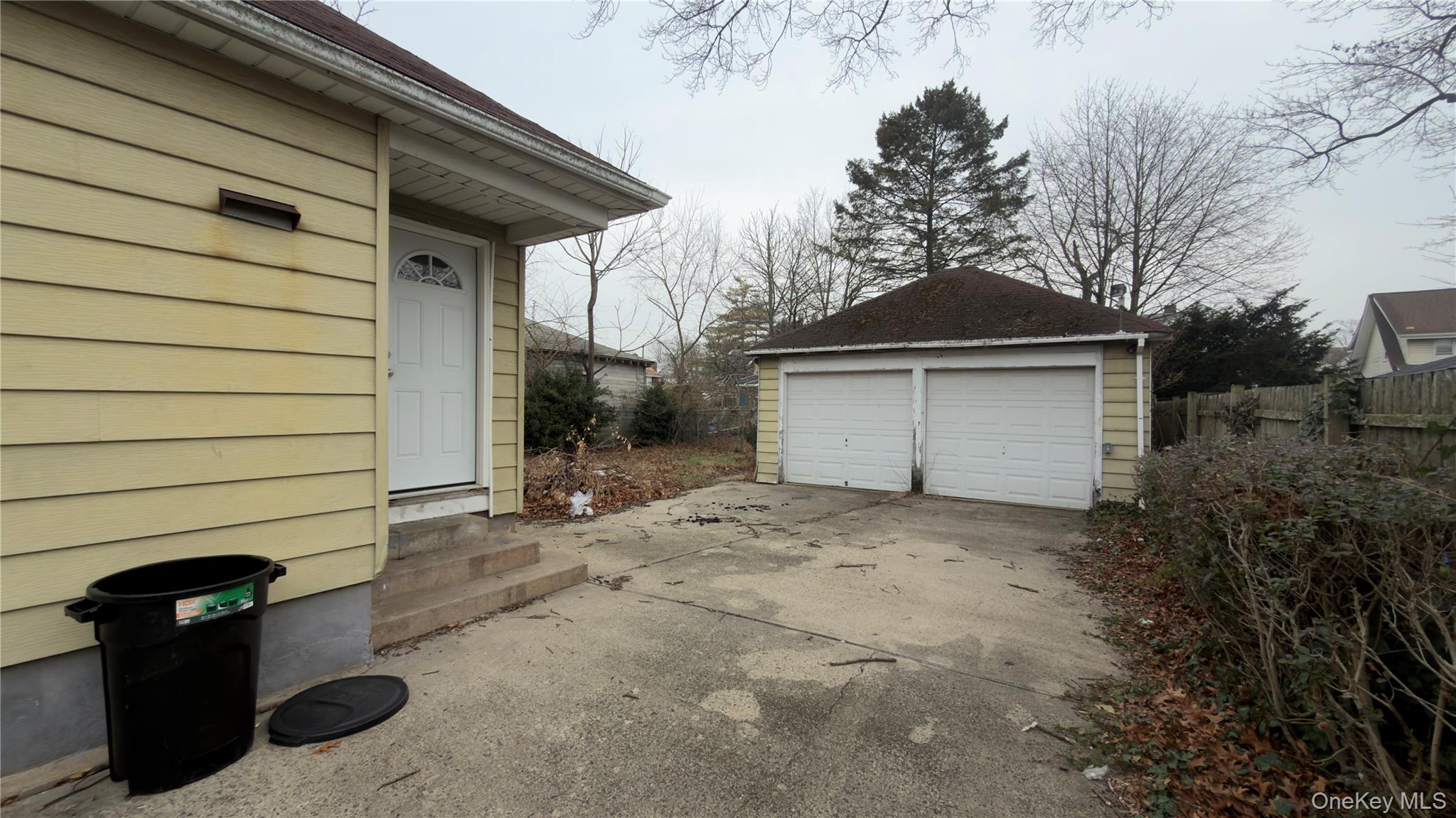 225 Church Street, Unit 2 Freeport, NY 11520 - Photo 7 of 18 a front view of a house with shower