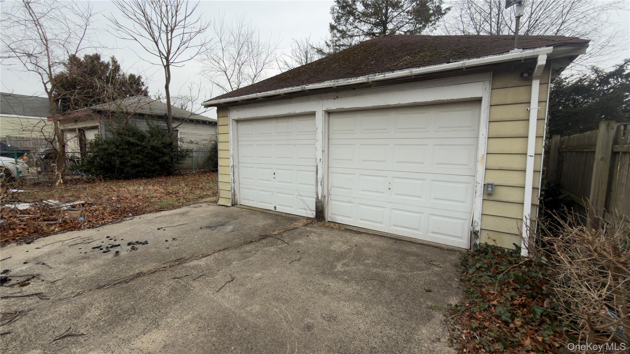 225 Church Street, Unit 2 Freeport, NY 11520 - Photo 8 of 18 a small white house with a outdoor space