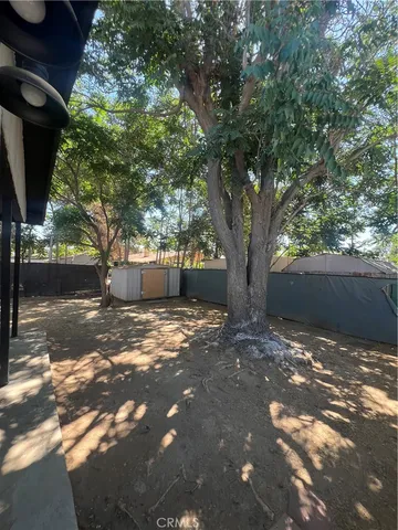 a view of backyard with green space