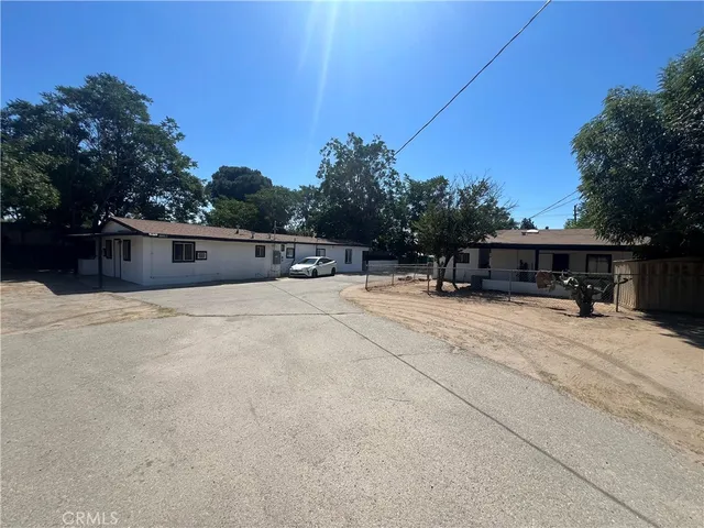 a view of house with outdoor space and entertaining space