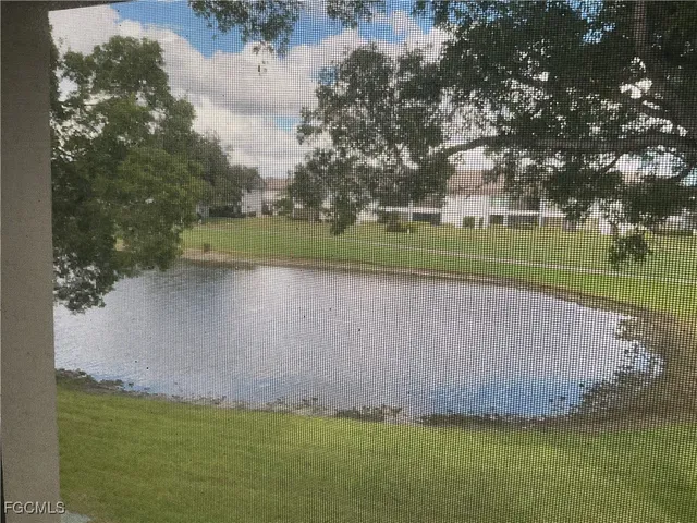 a view of swimming pool from a window