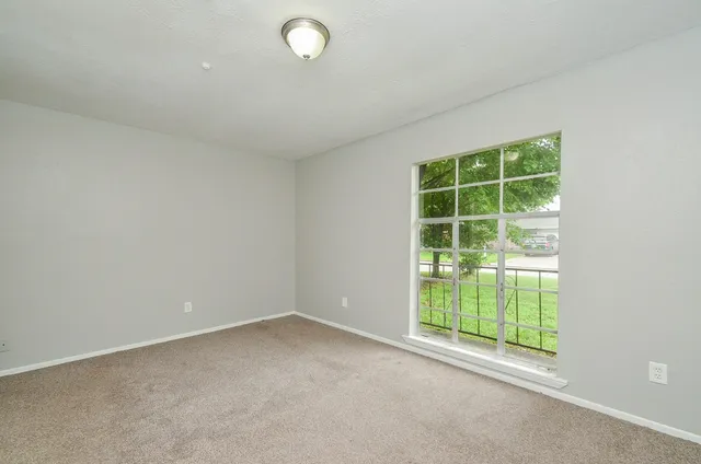 an empty room with a window