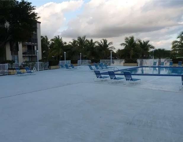 a view of outdoor space with patio and fire pit