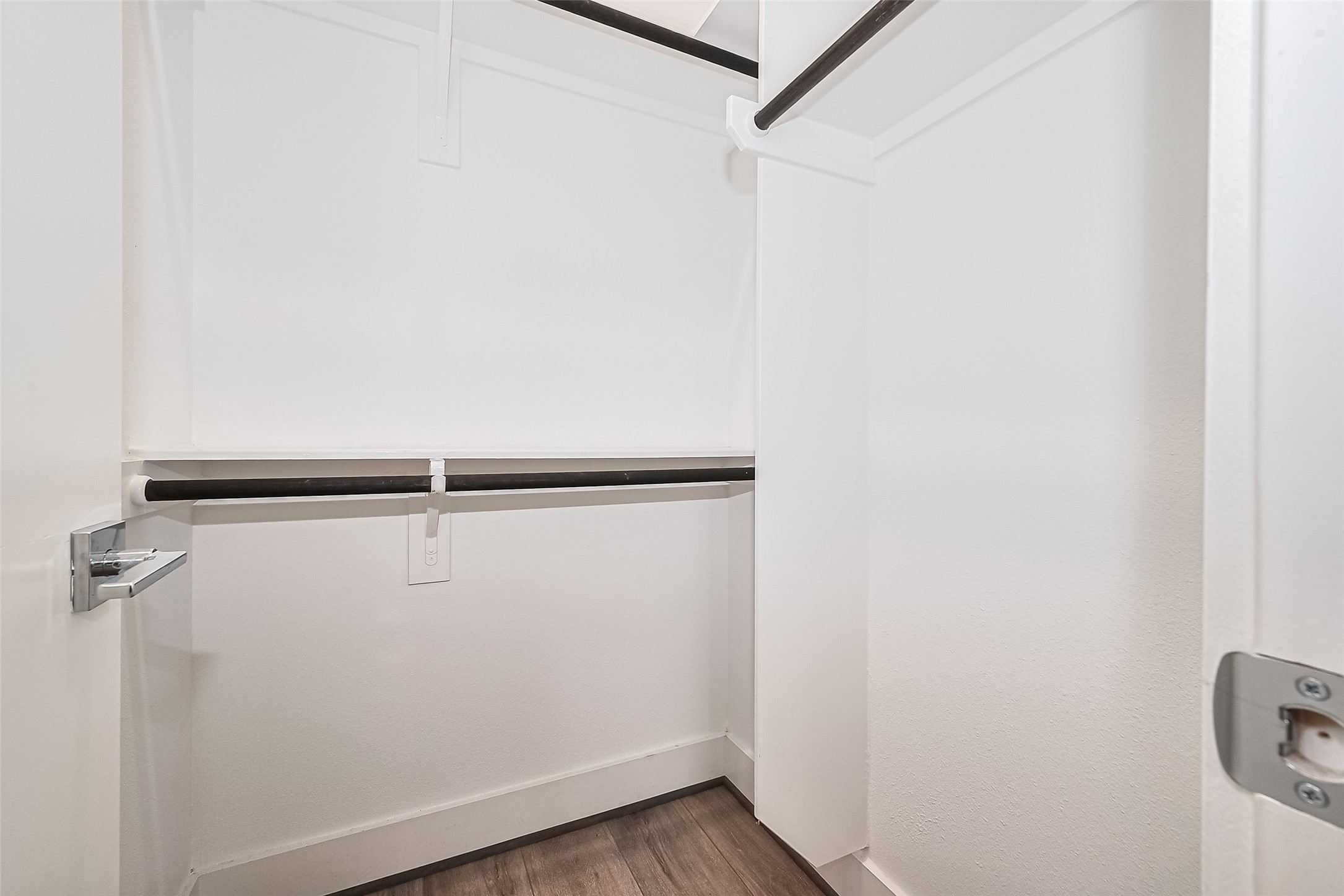 3510 Hadley Street Houston, TX 77004 - Photo 33 of 48 This closet offers custom-built racks and hanging rods, maximizing storage and keeping organization effortless.